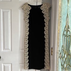 Women’s black and gold dress